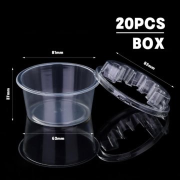 Clear plastic tattoo cartridge box with 20 compartments for ink and needles.