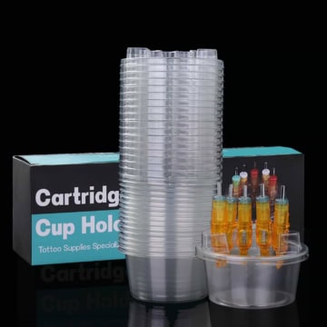 Set of 20 tattoo cartridge cups with colorful ink tips for tattooing.