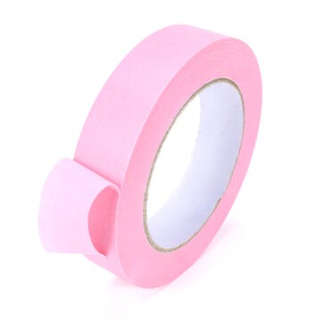 Pink masking tape roll for tattooing and art projects.