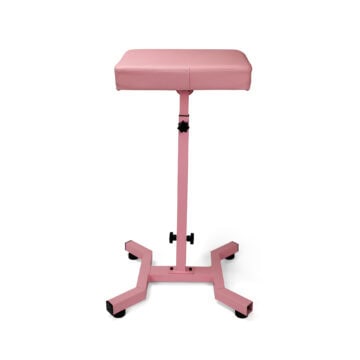 Pink tattoo arm support stand for tattoo artists and equipment.
