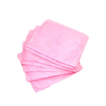 Pink TNT cover for chair or Marquesa, ideal for tattoo studios.