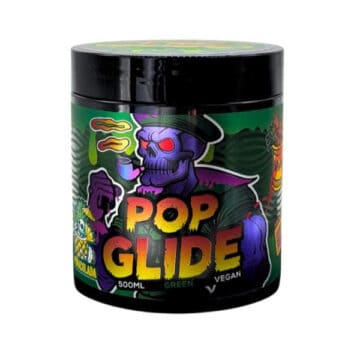 Vibrant green tattoo ink in a colorful skull-themed container.